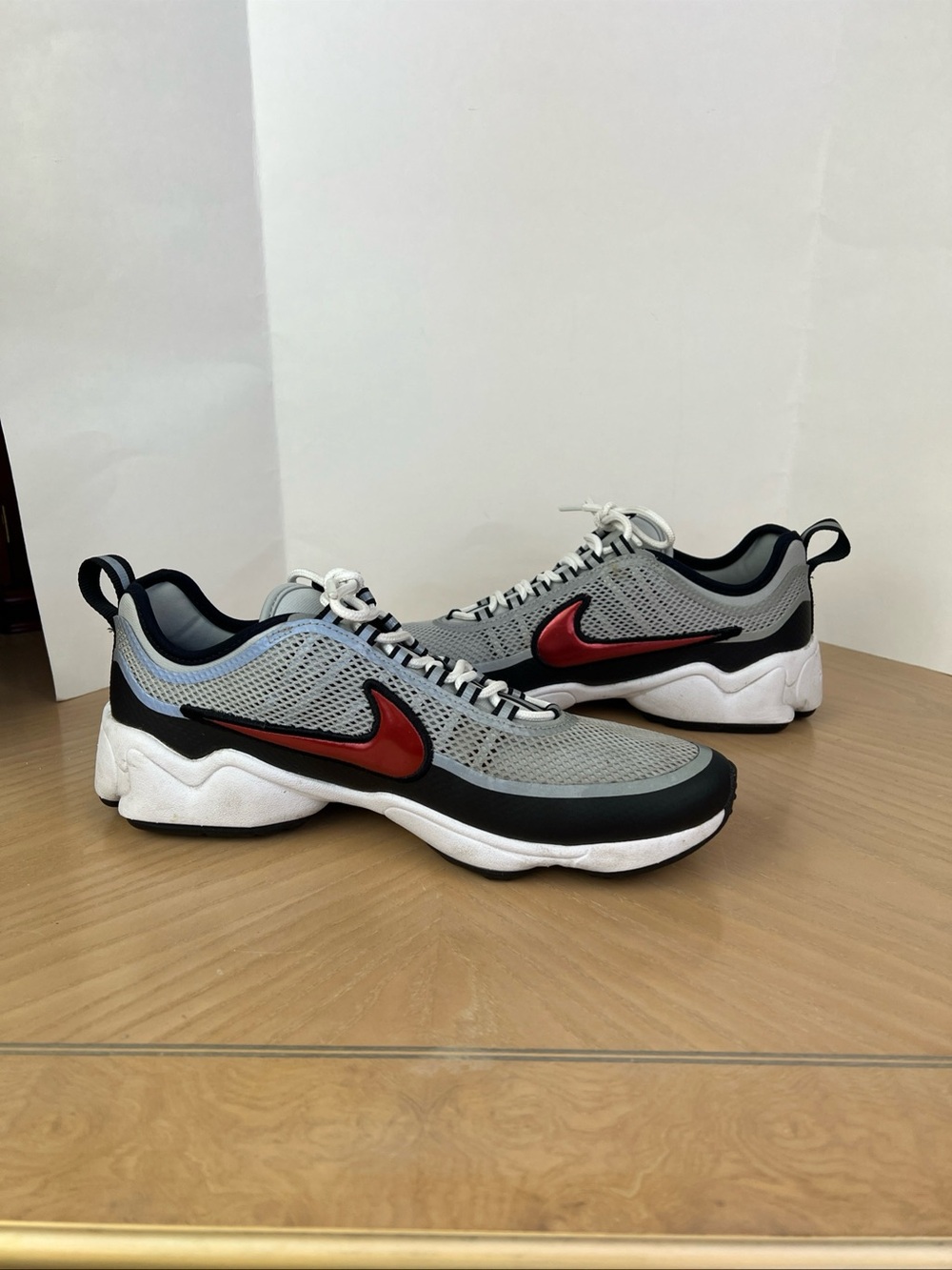 Nike Grey Mesh Sneakers with Red Swoosh and Black Trim